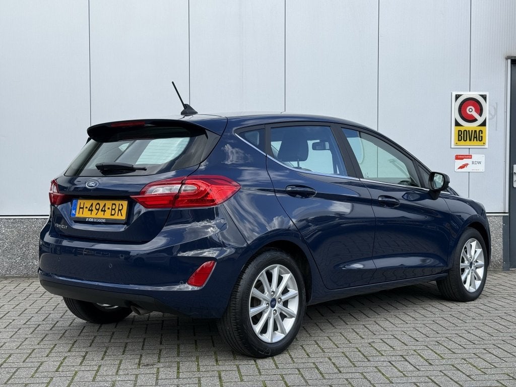 Ford Fiesta 1.0 EcoB. Titanium | NAP | CarPlay | Park.sensor, Stof, Gebruikt, 580 kg, Blauw
