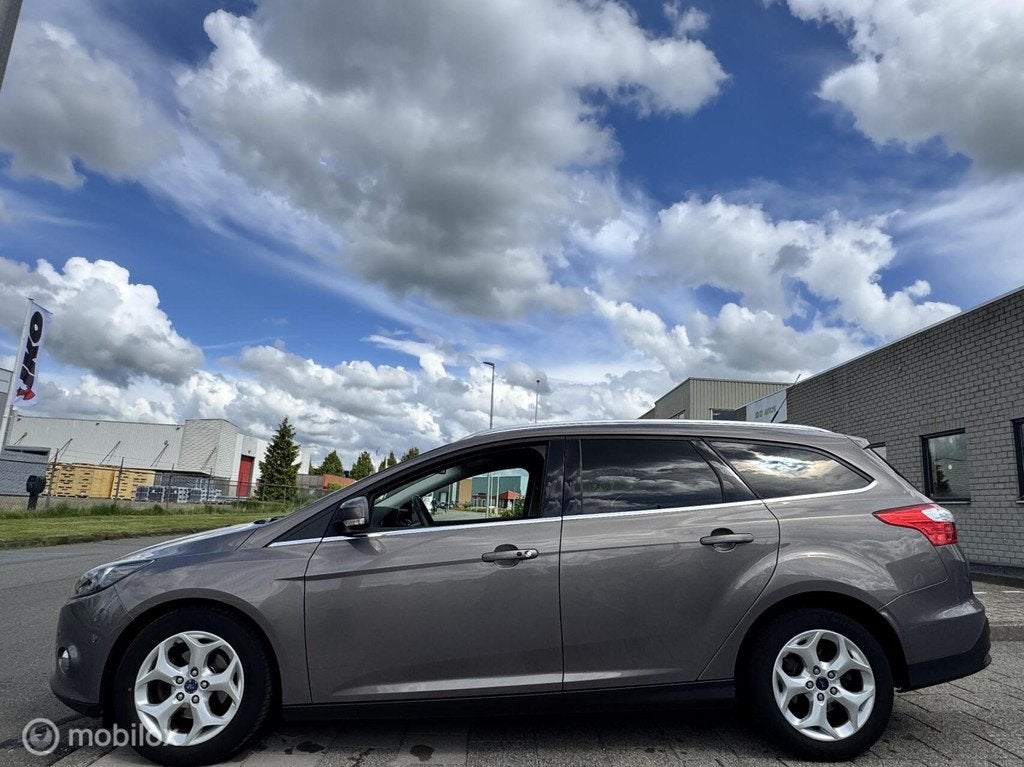 Ford Focus Wagon 1.6 TDCI ECOnetic Lease Titanium|Leer Navi, Auto's, Euro 5, 4 cilinders, Bruin, 1560 cc