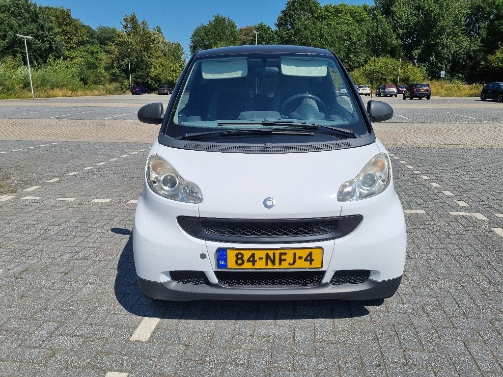 Smart ForTwo 1.0 45KW Coupe MHD AUT 2010 Zwart, Auto's, Automaat, 18 €/maand, 61 pk, Origineel Nederlands