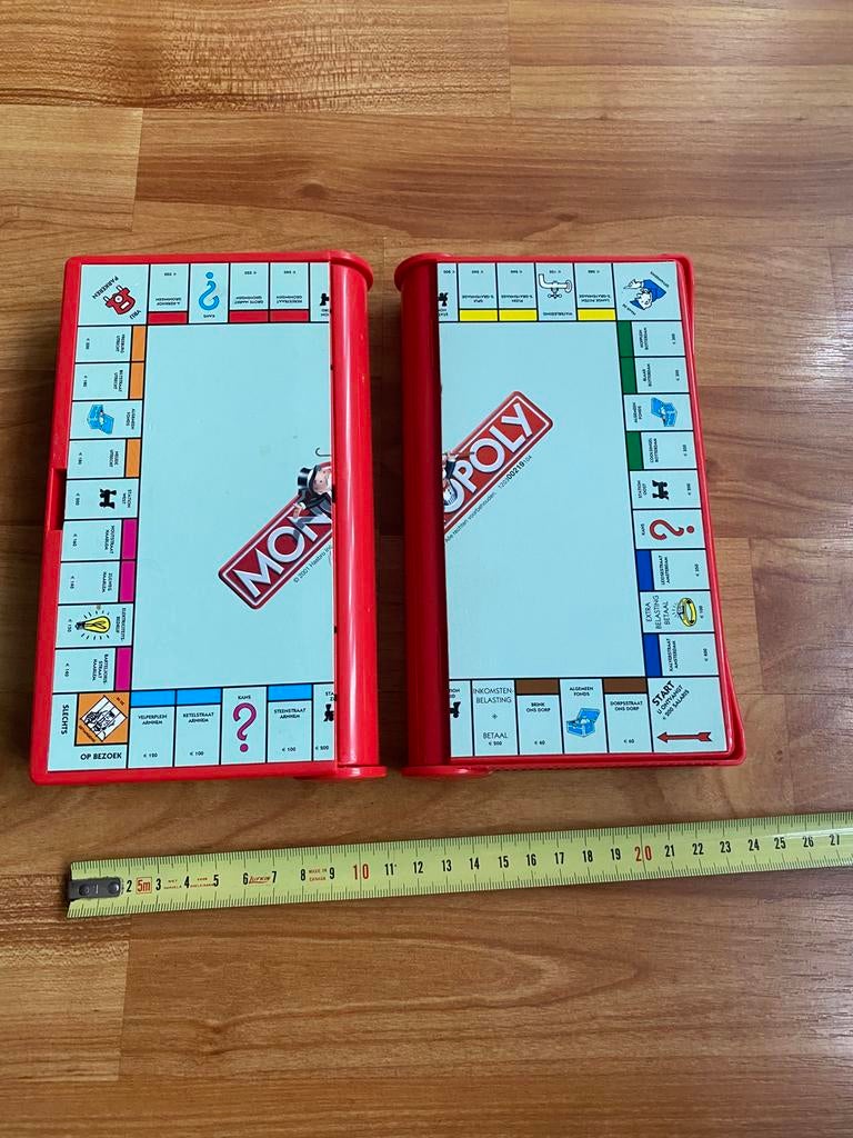 Monopoly Reisspel - 2 Stuks Compacte Editie, Hobby en Vrije tijd, Gezelschapsspellen | Bordspellen, Drie of vier spelers, Ophalen of Verzenden