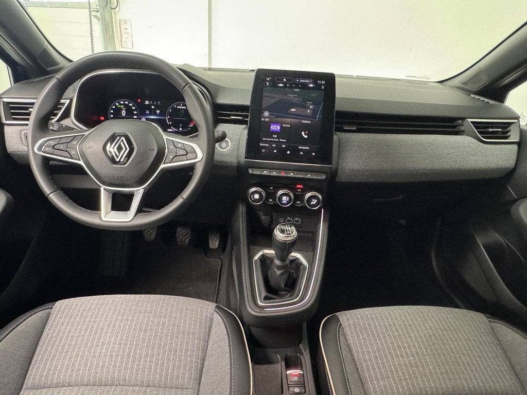 Renault Clio 1.0 TCe 90 GPF Techno | Navigatie | 360° Camer, Gebruikt, Met garantie (alle), Blauw, Leder en Stof