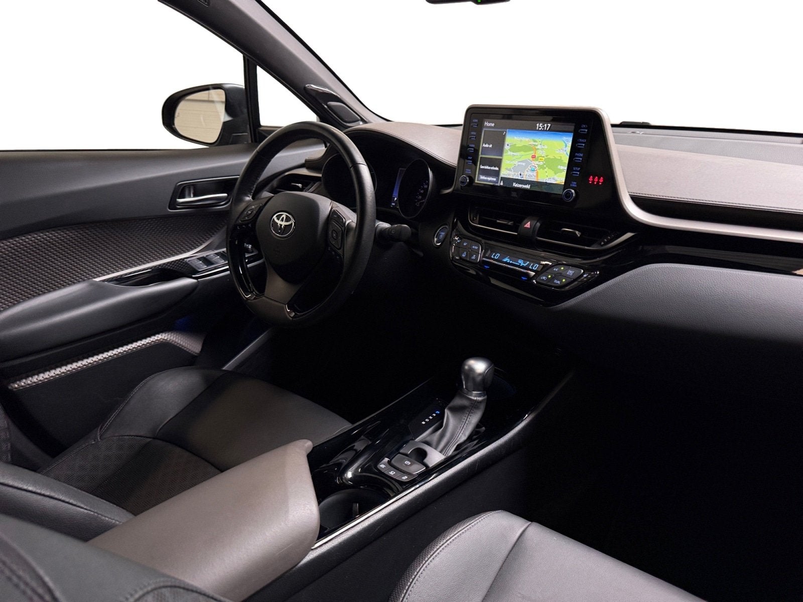 Toyota C-HR 1.8 Hybrid Executive I Elek. Stoelen I Leder I C, Auto's, Euro 6, 4 cilinders, Hybride Elektrisch/Benzine, Automatische klimaatregeling