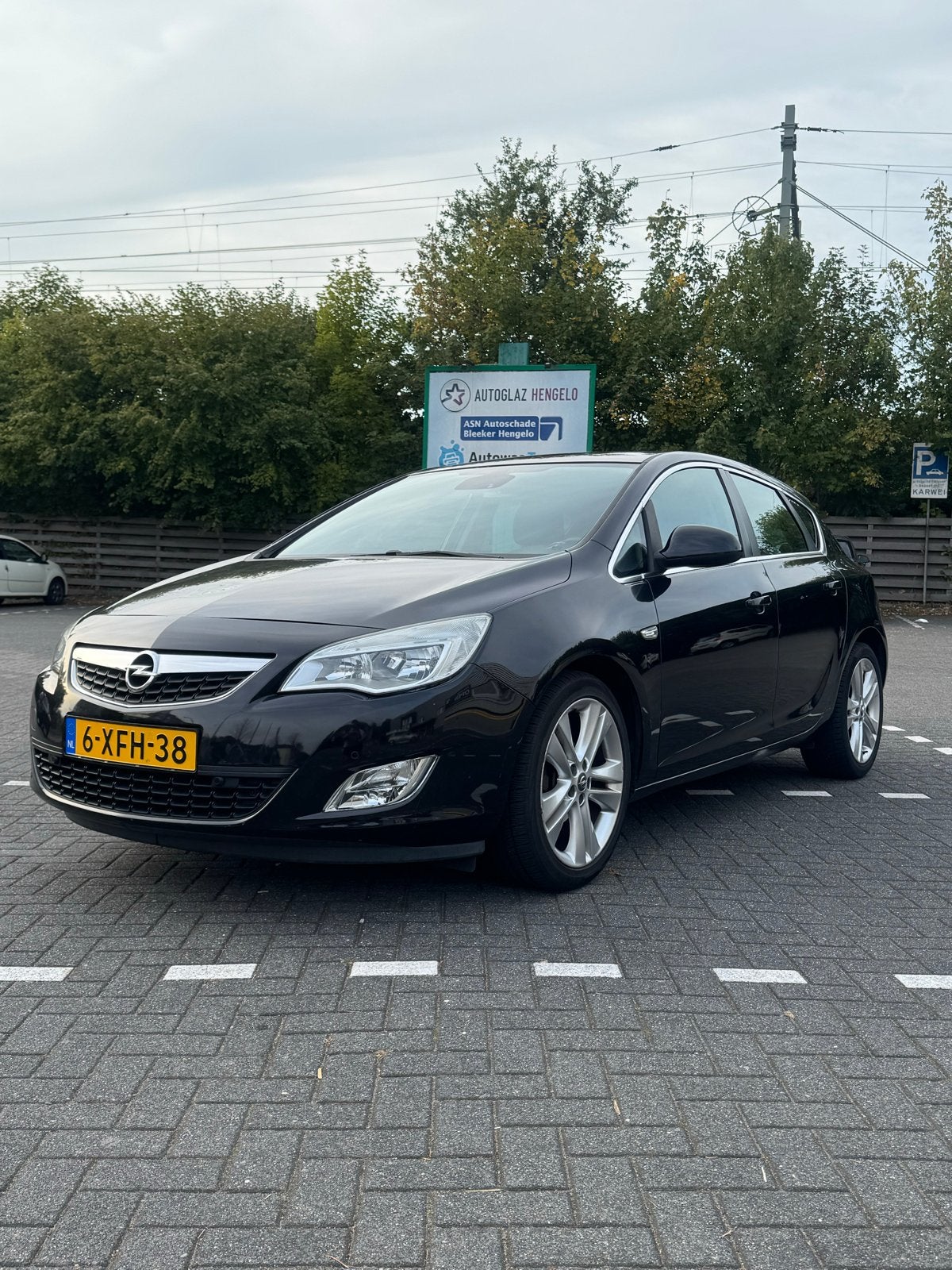 Opel Astra 1.4 Turbo Ecotec 103KW 5-D 2010 Zwart, Auto's, Voorwielaandrijving, Stof, 4 cilinders, Zwart