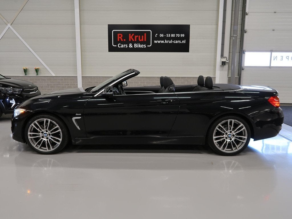 BMW 4-serie Cabrio 430i High Executive Sport 252pk Zwart Lee, Automaat, Achterwielaandrijving, Gebruikt, 4 stoelen