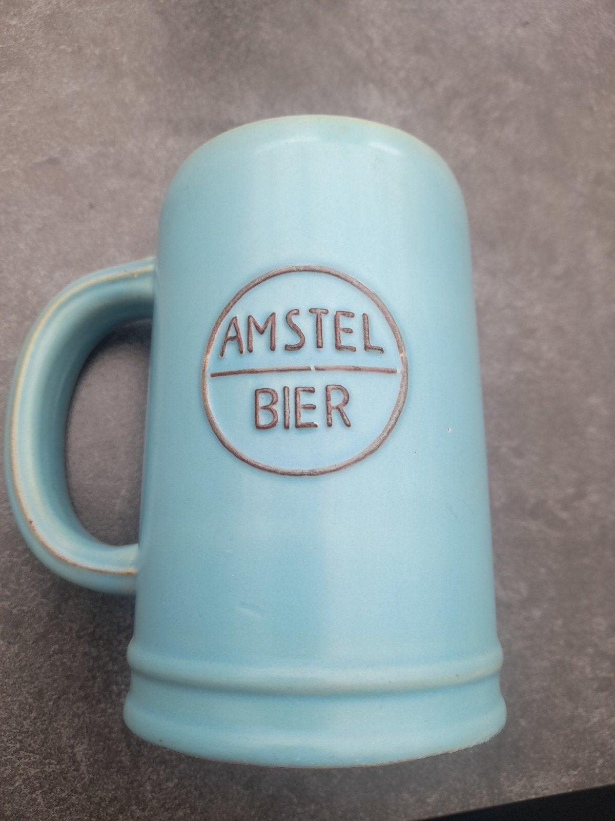 Keramieken bierpul Amstel Bier (lichtblauw), Ophalen of Verzenden, Gebruikt, Pul(len), Amstel