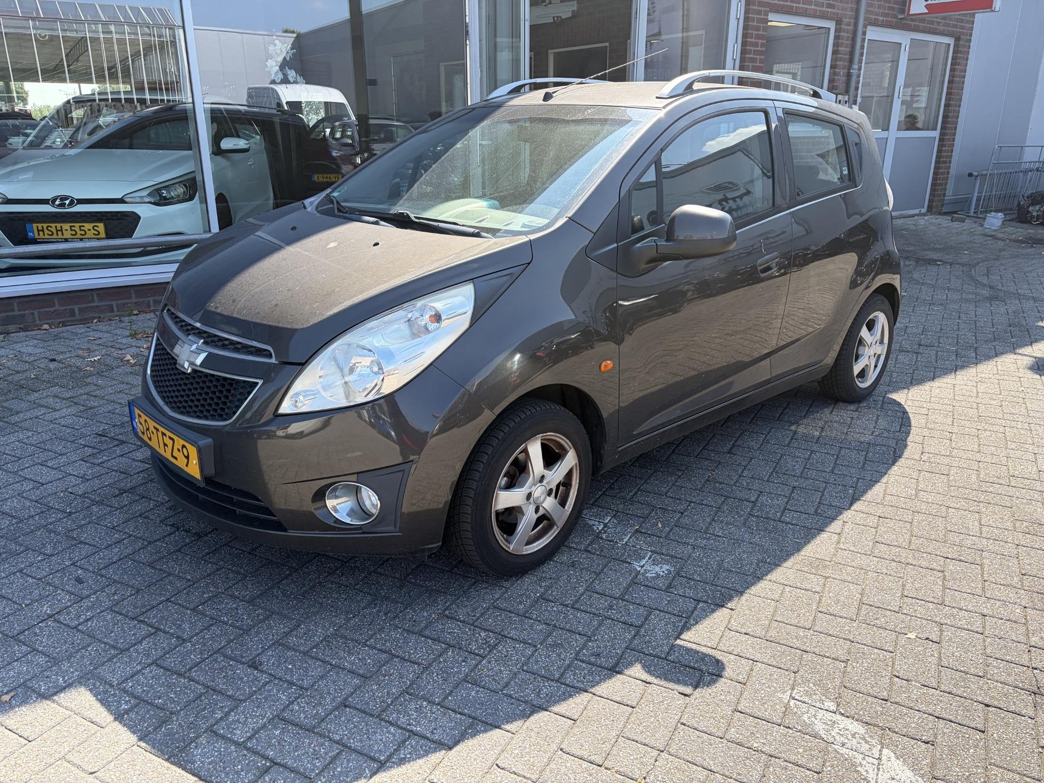 Chevrolet Spark 1.0 16V LS Bi-Fuel Versnellingsbak maakt gel, Auto's, Euro 5, Stof, 4 cilinders, Bruin