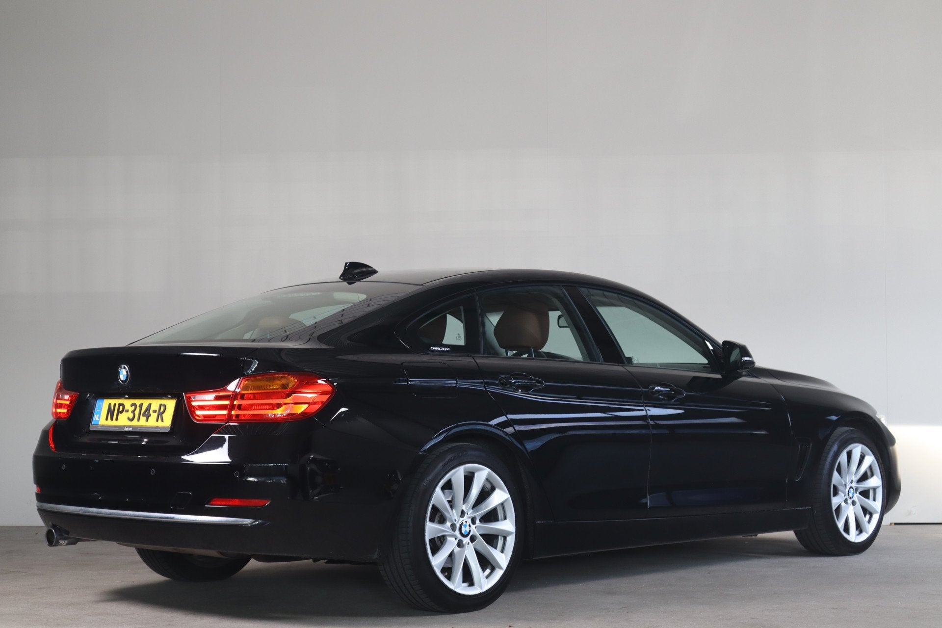 BMW 4 Serie Gran Coupé 418i Centennial High Executive - NL-, Auto's, Gebruikt, Euro 6, Zwart, 3 cilinders