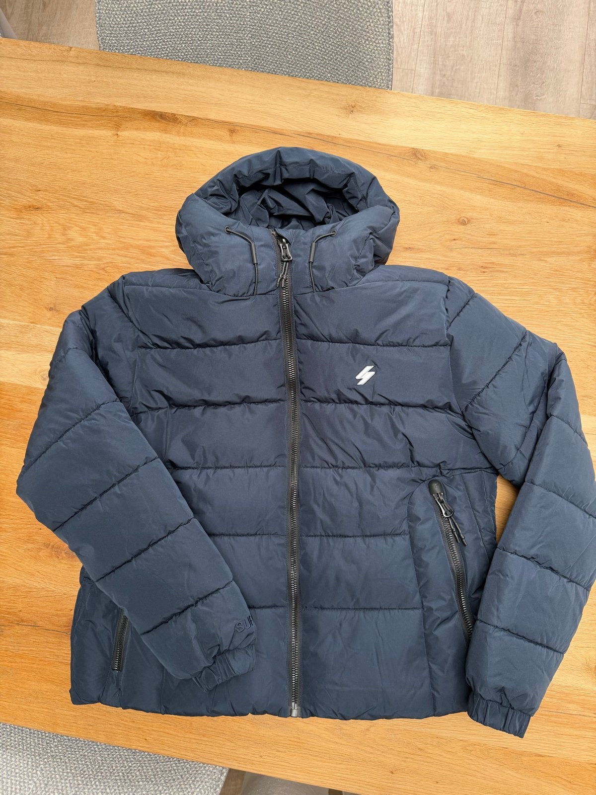 Superdry Sports Puffer Jas Donkerblauw Maat 44, Ophalen of Verzenden, Zo goed als nieuw, Maat 42/44 (L), Blauw