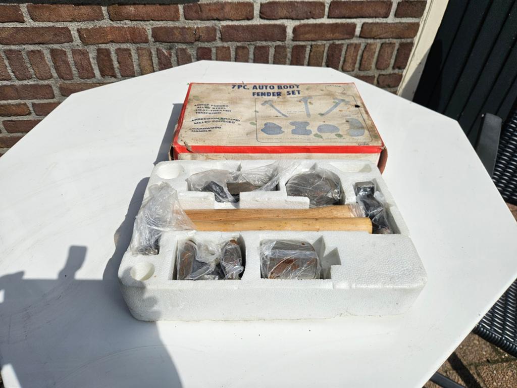 Auto uitdeukset, Ophalen
