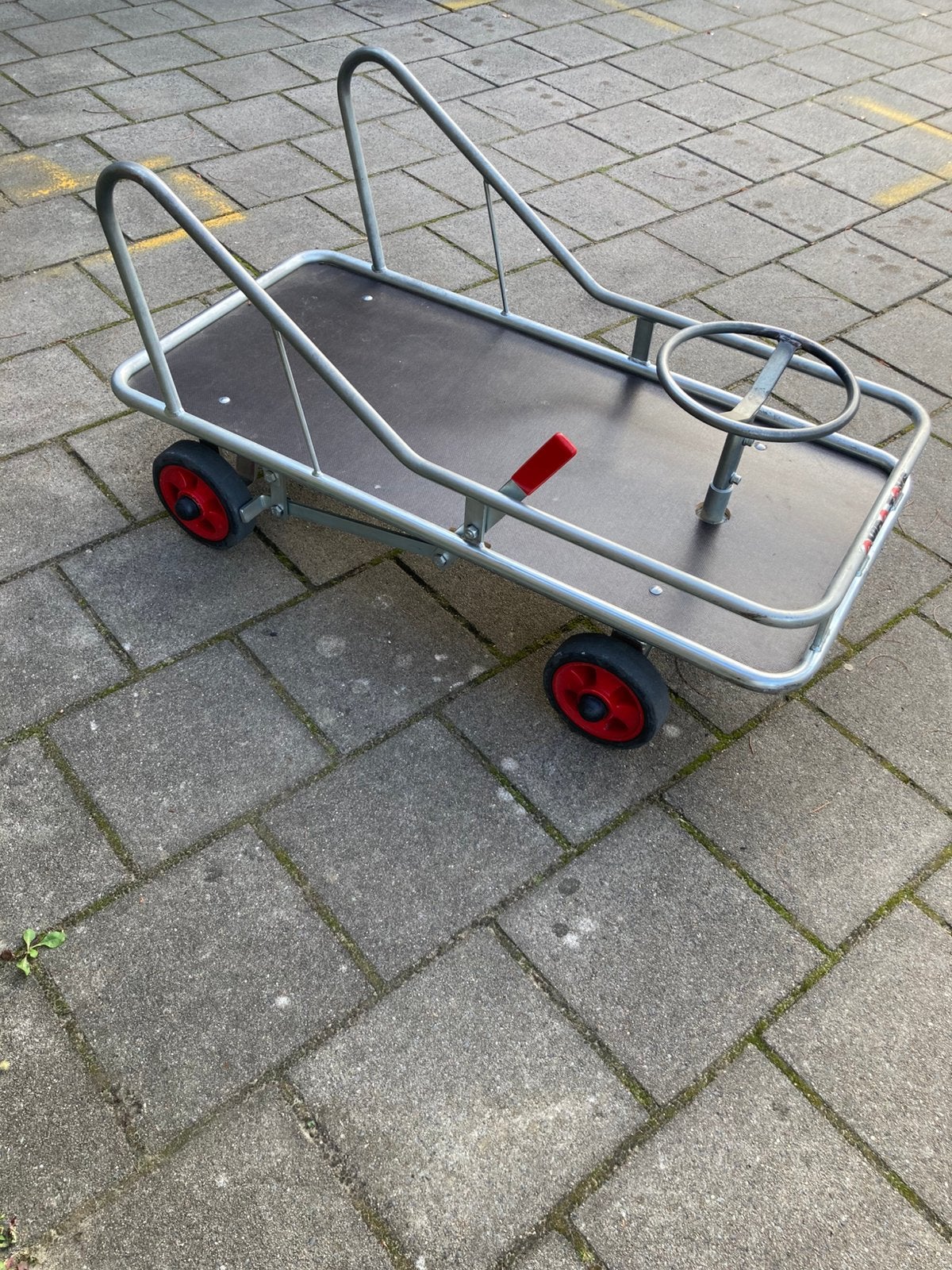 Kar met stuur en rem, Ophalen, Zo goed als nieuw