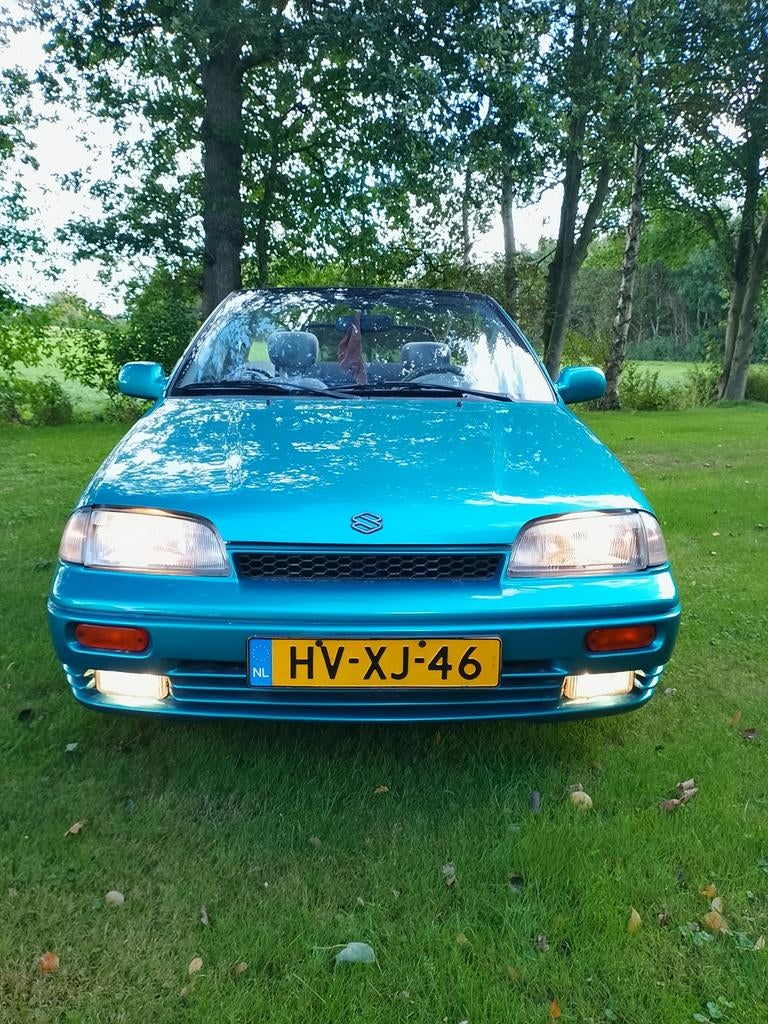 Suzuki Swift 1.3 Cabrio U9 1994 Blauw aangeboden, Voorwielaandrijving, Stof, 4 cilinders, Cabriolet