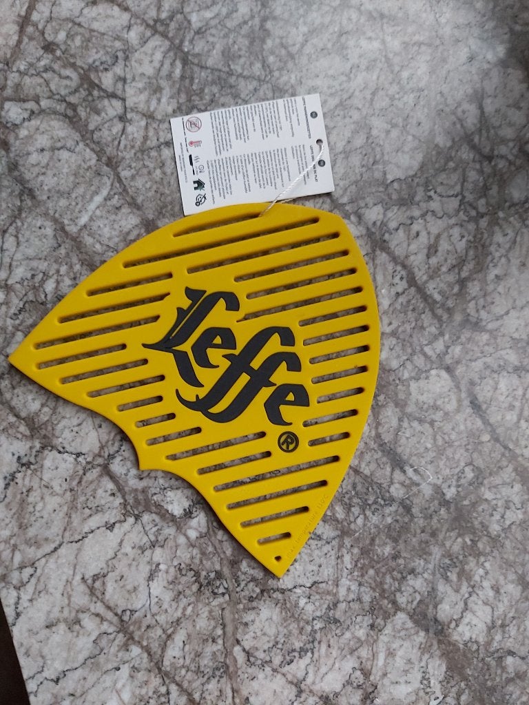 Pannenonderzetter Leffe, Overige typen, Ophalen of Verzenden, Nieuw, Geel