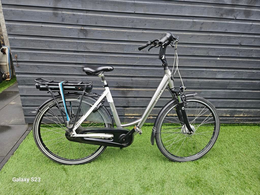 Nette  electrische stella  livorna  met 7 versnellingen, Fietsen en Brommers, Fietsen | Meisjes, Ophalen of Verzenden, Zo goed als nieuw