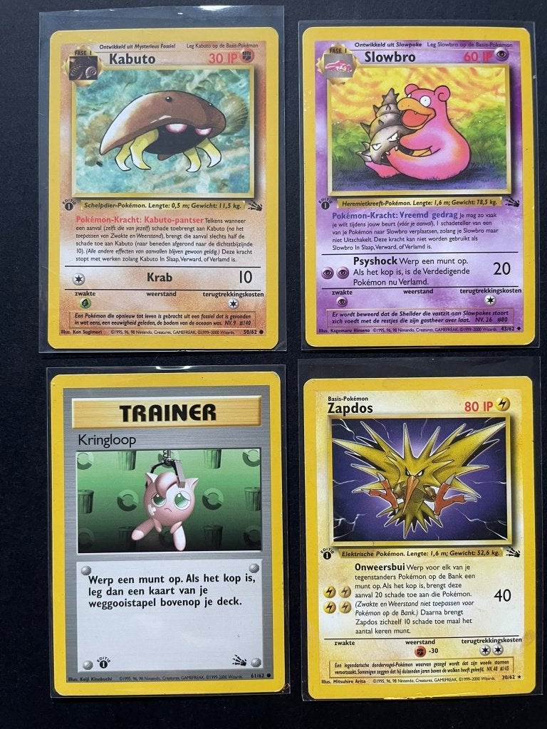 1st edition pokemon kaarten NL (Fossil), Ophalen of Verzenden, Zo goed als nieuw, Meerdere kaarten