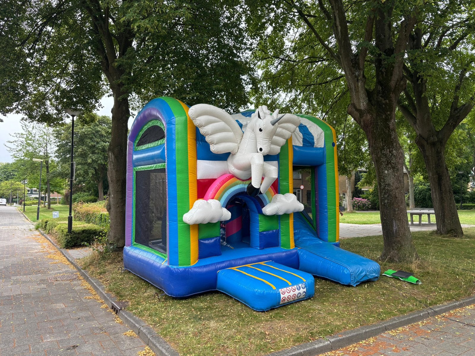 Magisch Unicorn springkussen met glijbaan te huur, Ophalen, Zo goed als nieuw