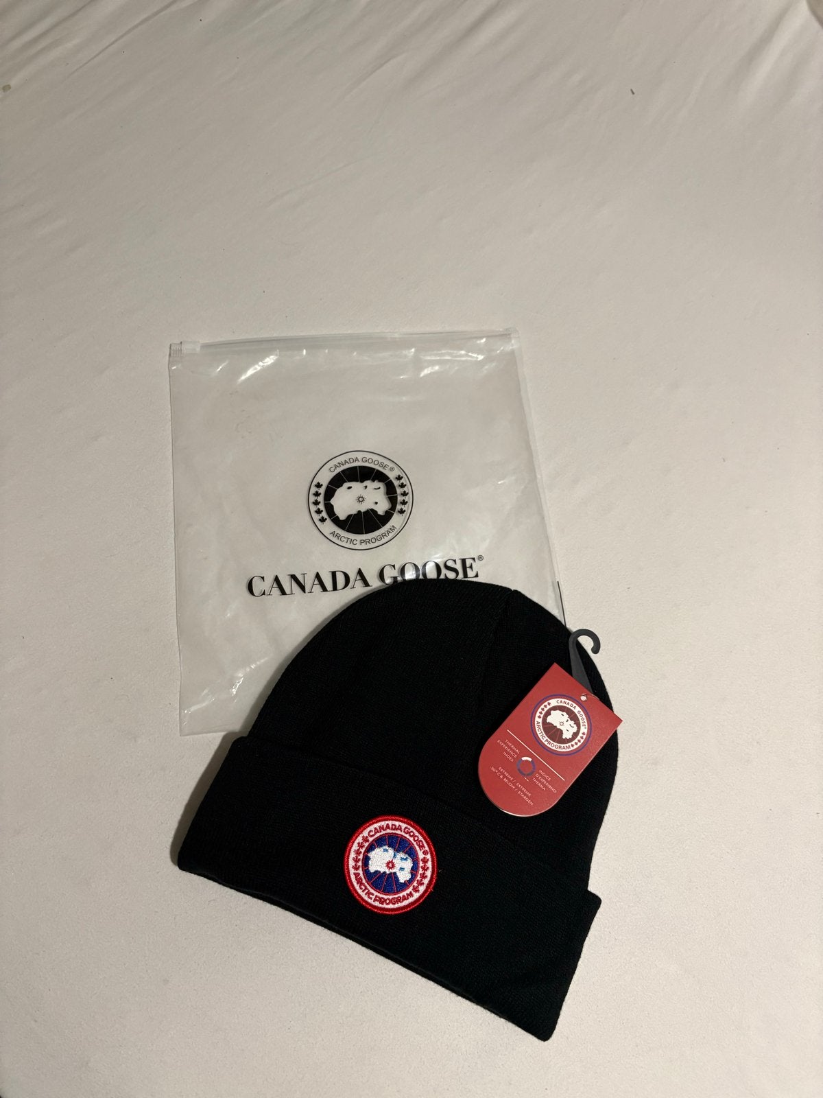 Canada Goose Muts Zwart - Nieuw met labels, Ophalen of Verzenden, Nieuw, Maat 38/40 (M), Muts