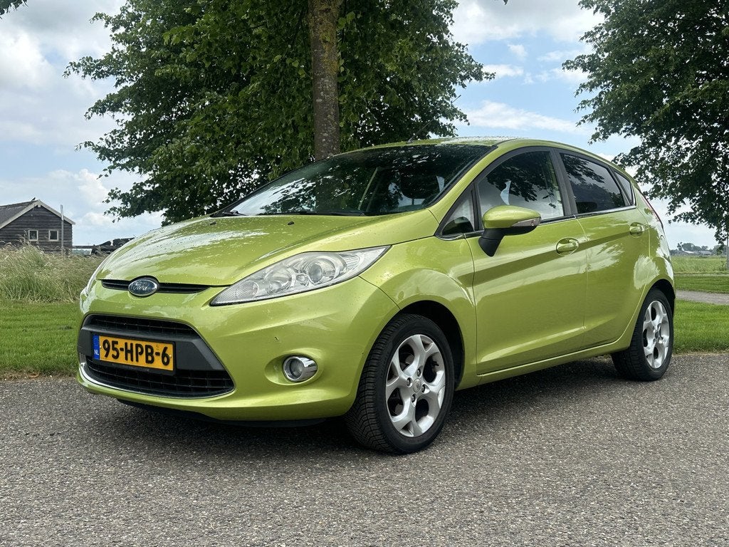 Ford Fiesta 1.4 Titanium NAP * Nette staat (bj 2009), Auto's, Voorwielaandrijving, Stof, Elektrische ramen, Origineel Nederlands