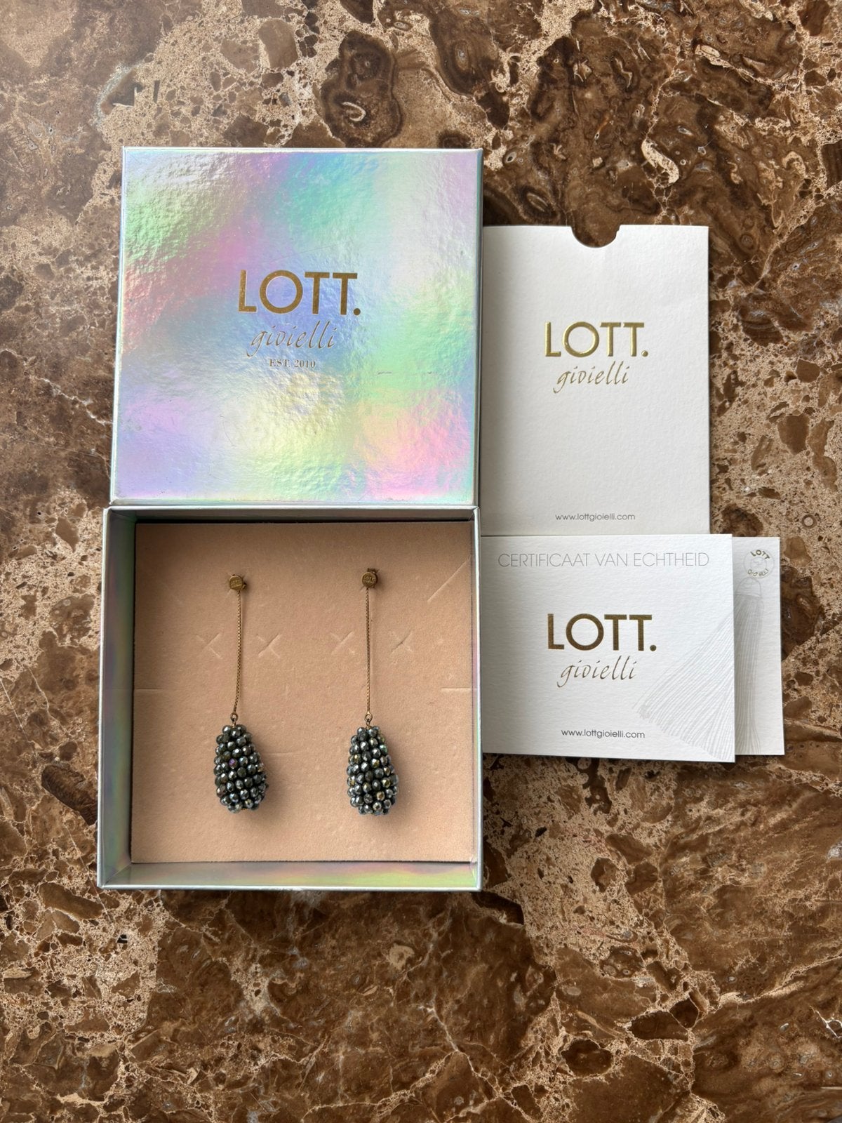 Lott Gioielli oorbellen - donkergrijs met geelgoud, Sieraden, Tassen en Uiterlijk, Oorbellen, Gebruikt, Ophalen of Verzenden, Grijs
