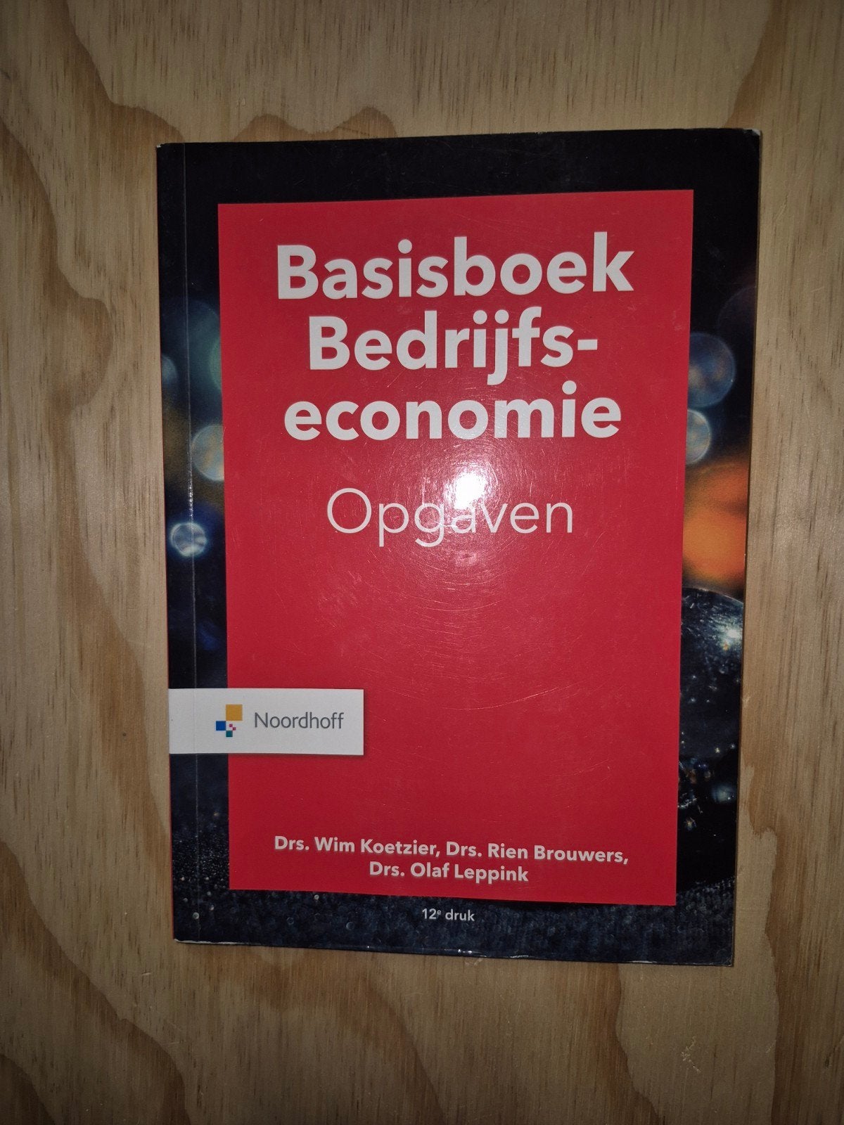 Basisboek Bedrijfseconomie Opgaven - 12e druk, Boeken, Ophalen of Verzenden, Gelezen, Economie en Marketing, Drs. Wim Koetzier, Drs. Rien Brouwers, Drs. Olaf Leppink