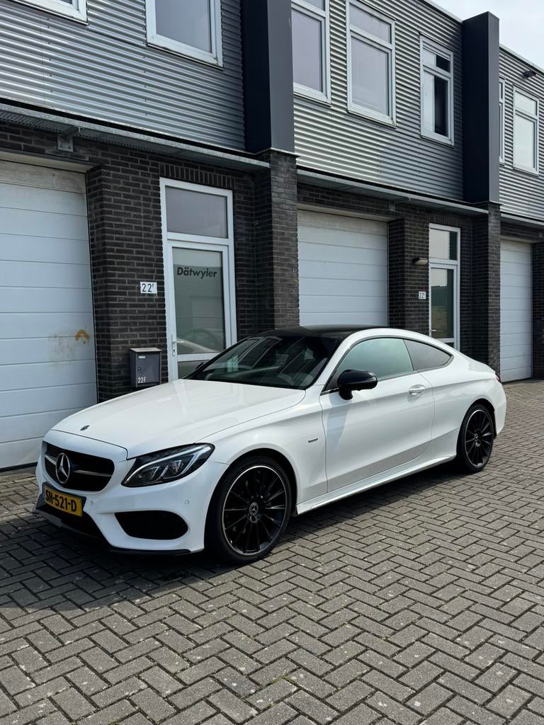 Mercedes-Benz C 180 Coupé AMG Line Night Edition | NL-auto, Auto's, Mercedes-Benz, Automaat, Achterwielaandrijving, 1800 kg, 4 stoelen