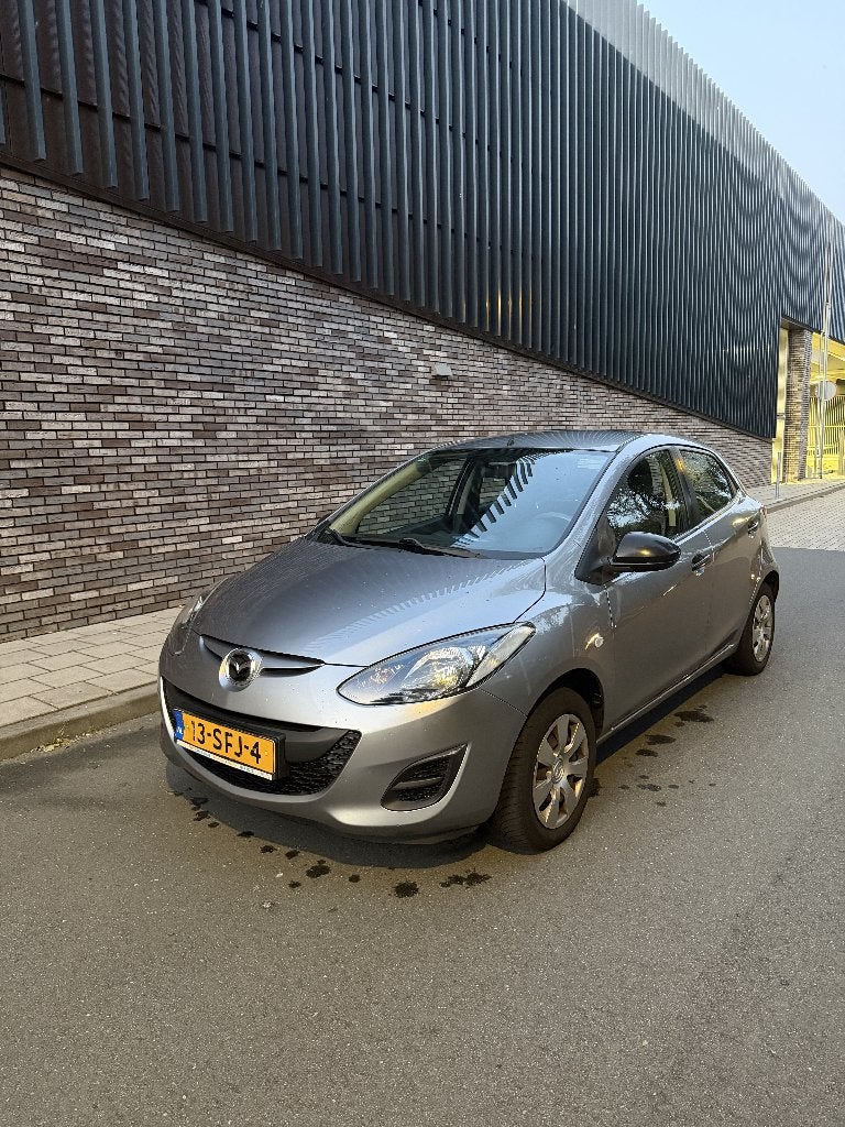 Mazda 2 1.3 Bifuel 75pk 5D 2011 Grijs - APK, Auto's, Mazda, Particulier, Benzine, A, Hatchback, Handgeschakeld, Origineel Nederlands