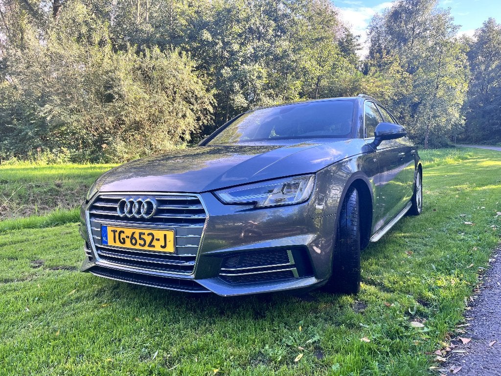 Audi A4 1.4 Tfsi 150pk S Tronic 2018 Grijs, Auto's, Dealer onderhouden, 4 cilinders, Origineel Nederlands, Verwarmde buitenspiegels