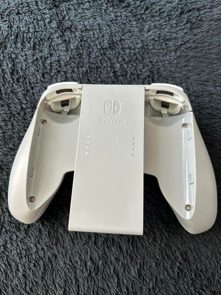Nintendo Switch Joycon Charging Grip Plus, 1 speler, Ophalen of Verzenden, Zo goed als nieuw, Vanaf 3 jaar
