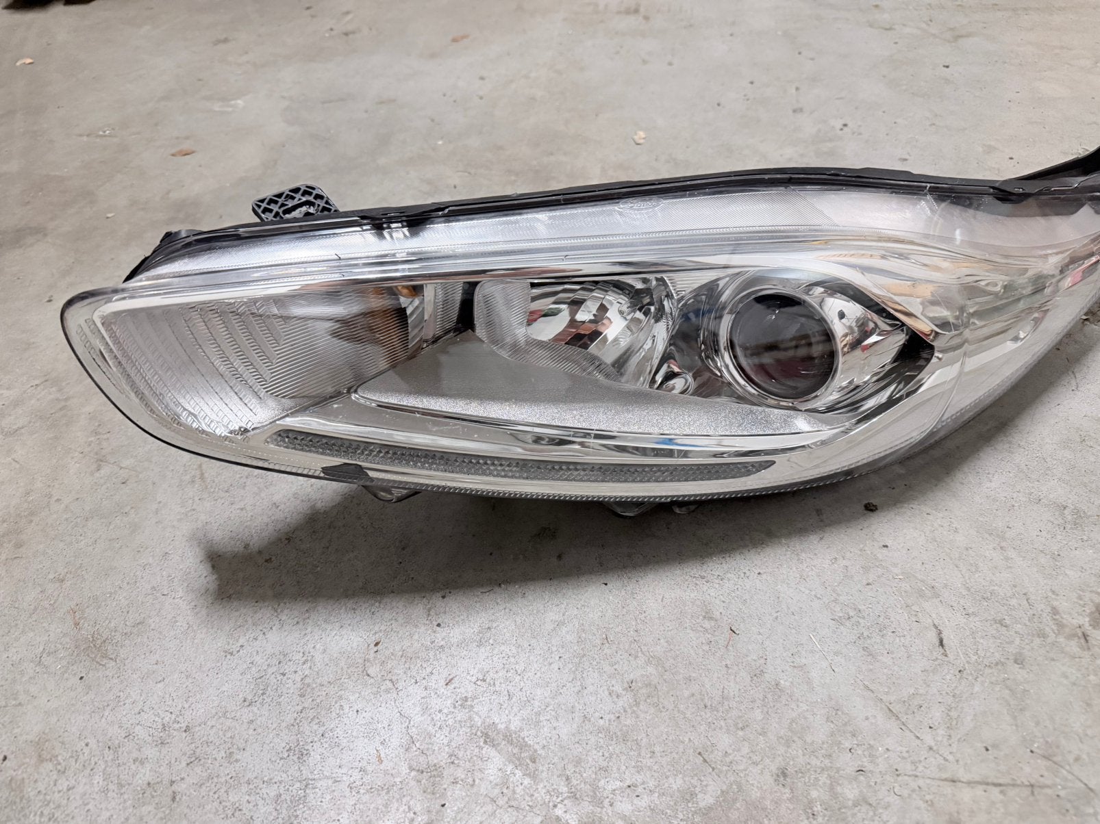 Koplamp links van een Ford Fiesta C1BB13W030, Ophalen of Verzenden, Ford
