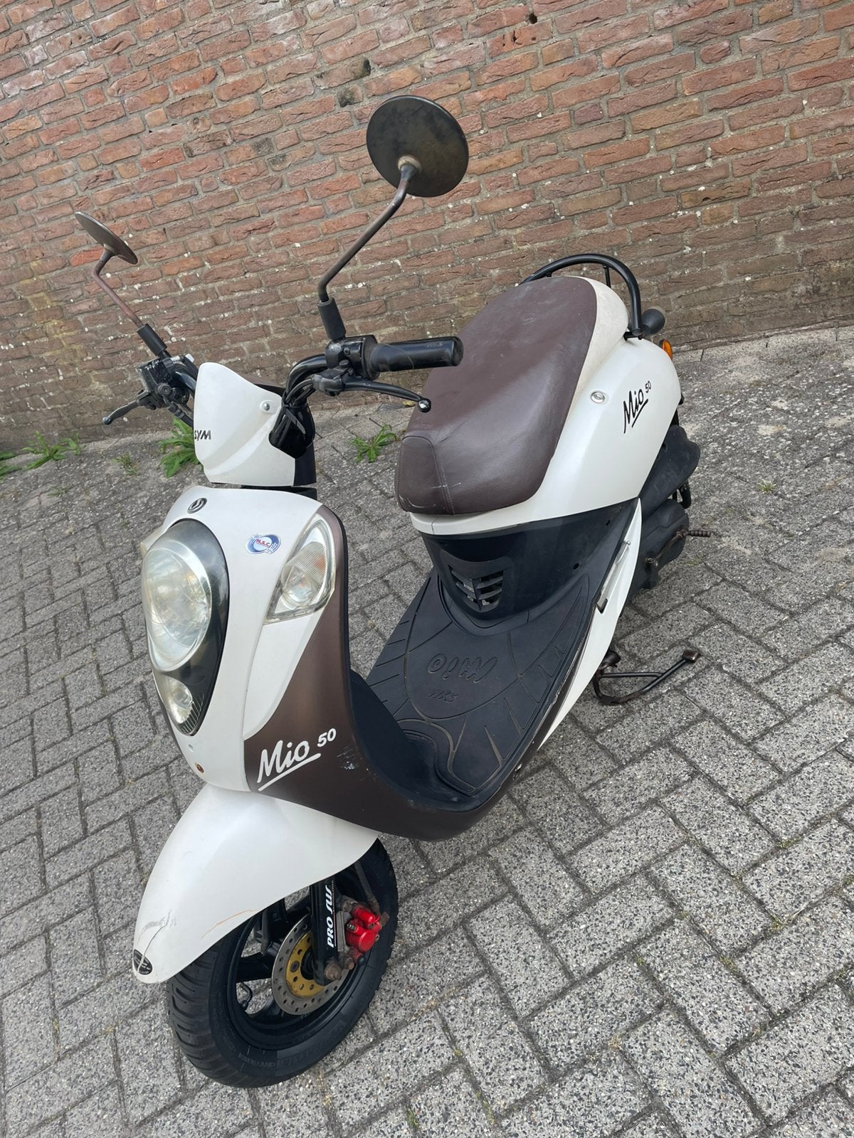 Sym mio snor scooter 2014, Fietsen en Brommers, Scooters | SYM, Gebruikt, Mio, Maximaal 25 km/u, Benzine, Ophalen