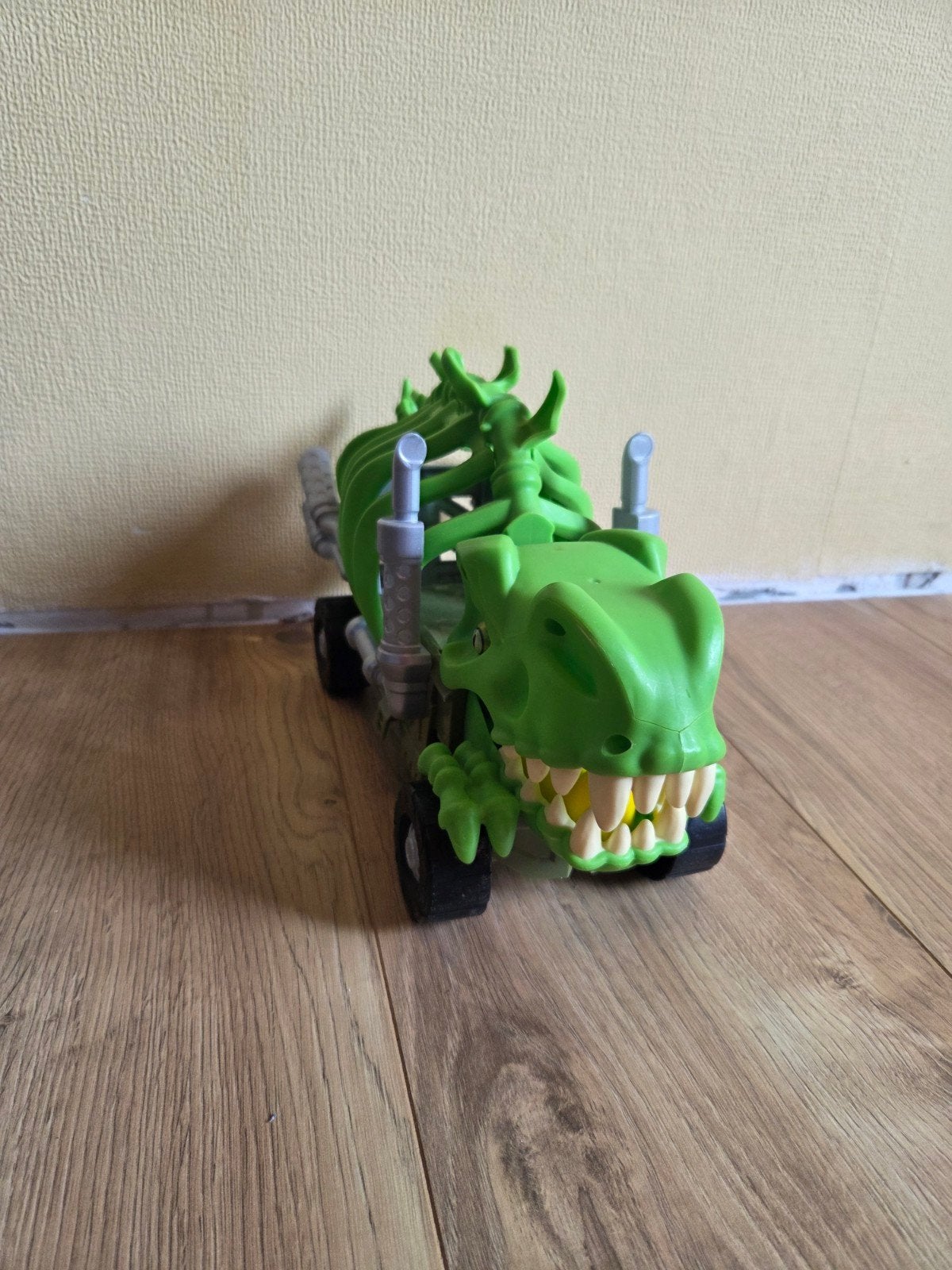 speelgoed dino auto, Ophalen