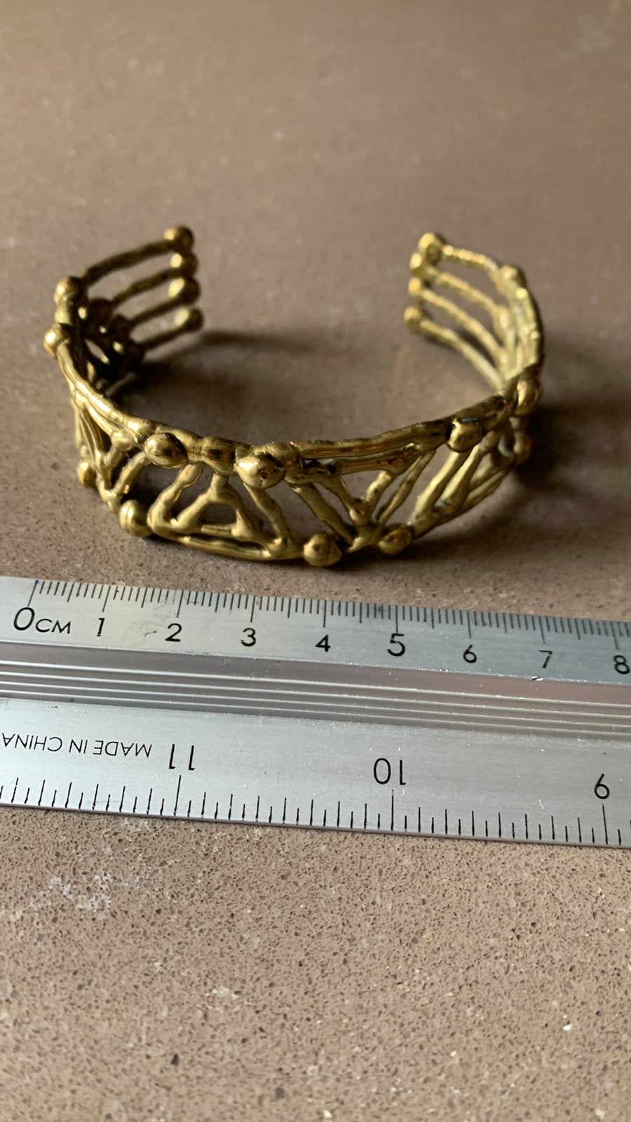 Oorbellen en klemarmband, Sieraden, Tassen en Uiterlijk, Armbanden, Ophalen of Verzenden, Gebruikt, Geel, Overige materialen