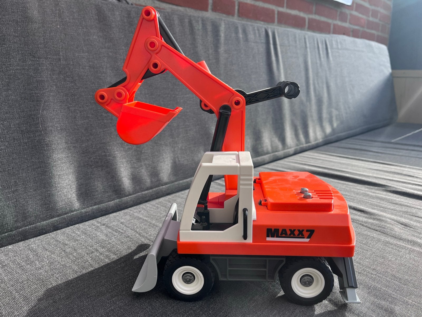 Speelgoed Graafmachine Maxx7 - Oranje, Ophalen, Zo goed als nieuw