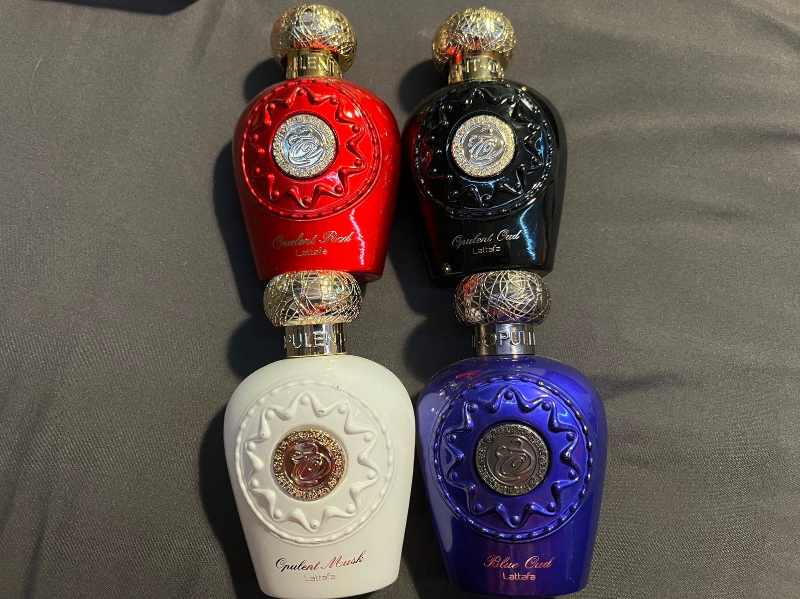 Lattafa opulent oud, musk, red, blue te ruil / koop, Ophalen of Verzenden, Zo goed als nieuw, Miniatuur