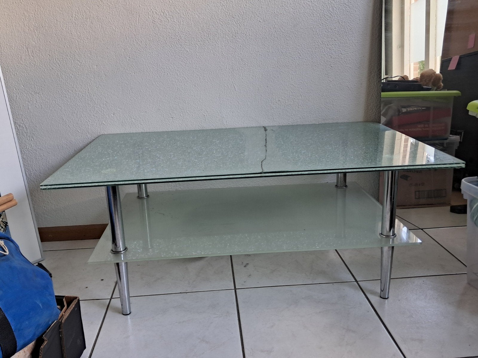Glazen salontafel met metalen poten, Ophalen, Gebruikt, 100 tot 150 cm, 50 tot 100 cm