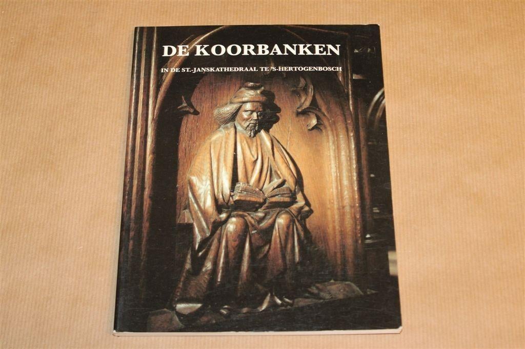 De Koorbanken Sint-Janskathedraal — A.M. Koldeweij, Ophalen of Verzenden, Gelezen