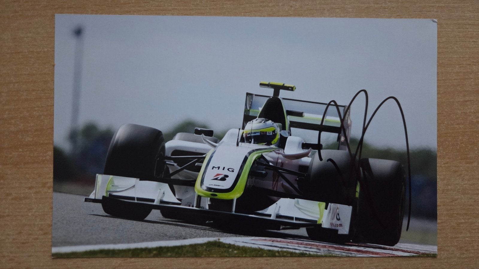 Gesigneerde foto Rubens Barrichello in Brawn GP F1-auto, Ophalen of Verzenden