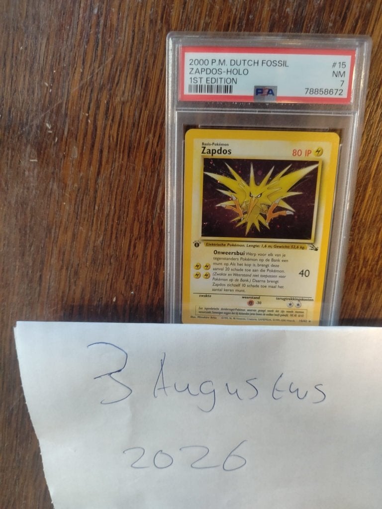Zapdos [1st Edition] #15 Pokemon kaart Dutch Fossil PSA 7, Hobby en Vrije tijd, Verzamelkaartspellen | Pokémon, Ophalen of Verzenden