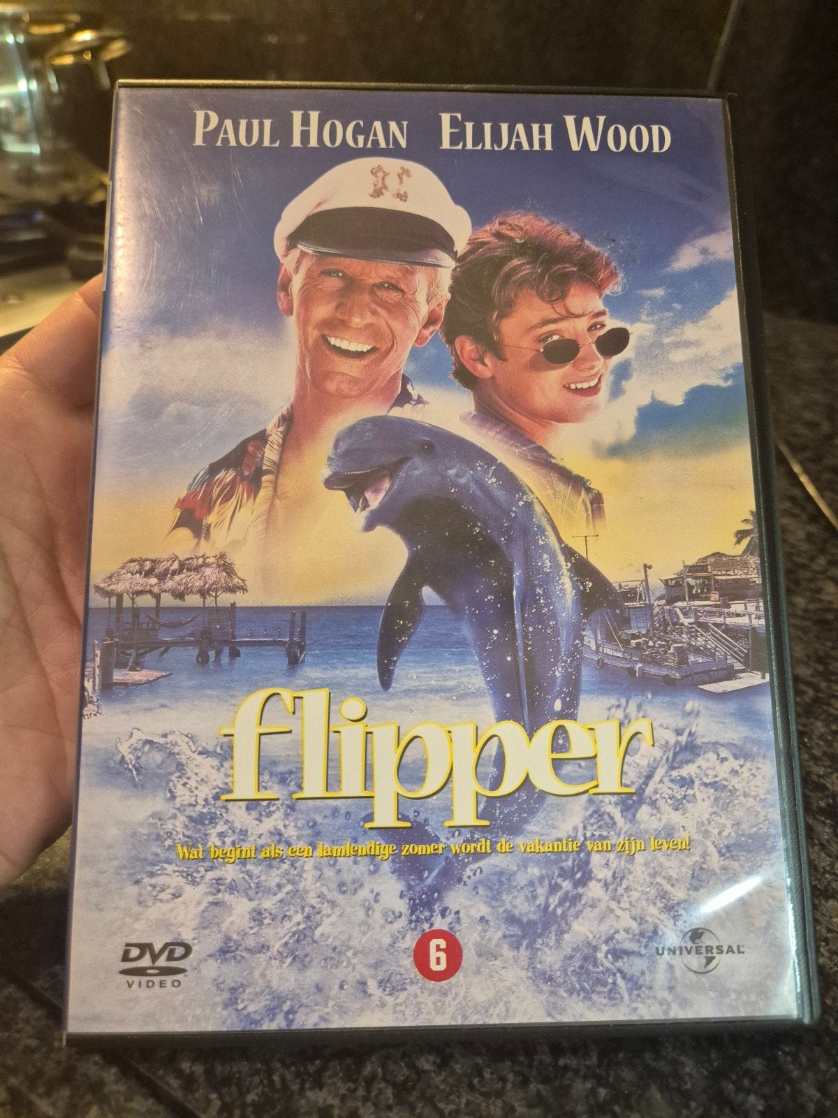 Flipper DVD - Paul Hogan & Elijah Wood, Spaans, Ophalen of Verzenden, Zo goed als nieuw, Spaans