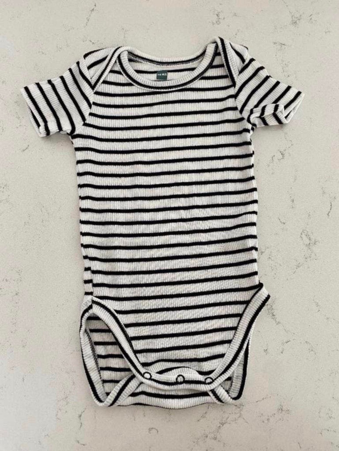 HEMA bamboe romper zwart/wit maat 50/56 | babykleding, Ophalen of Verzenden, Zo goed als nieuw, Jongetje of Meisje, Nacht- of Onderkleding