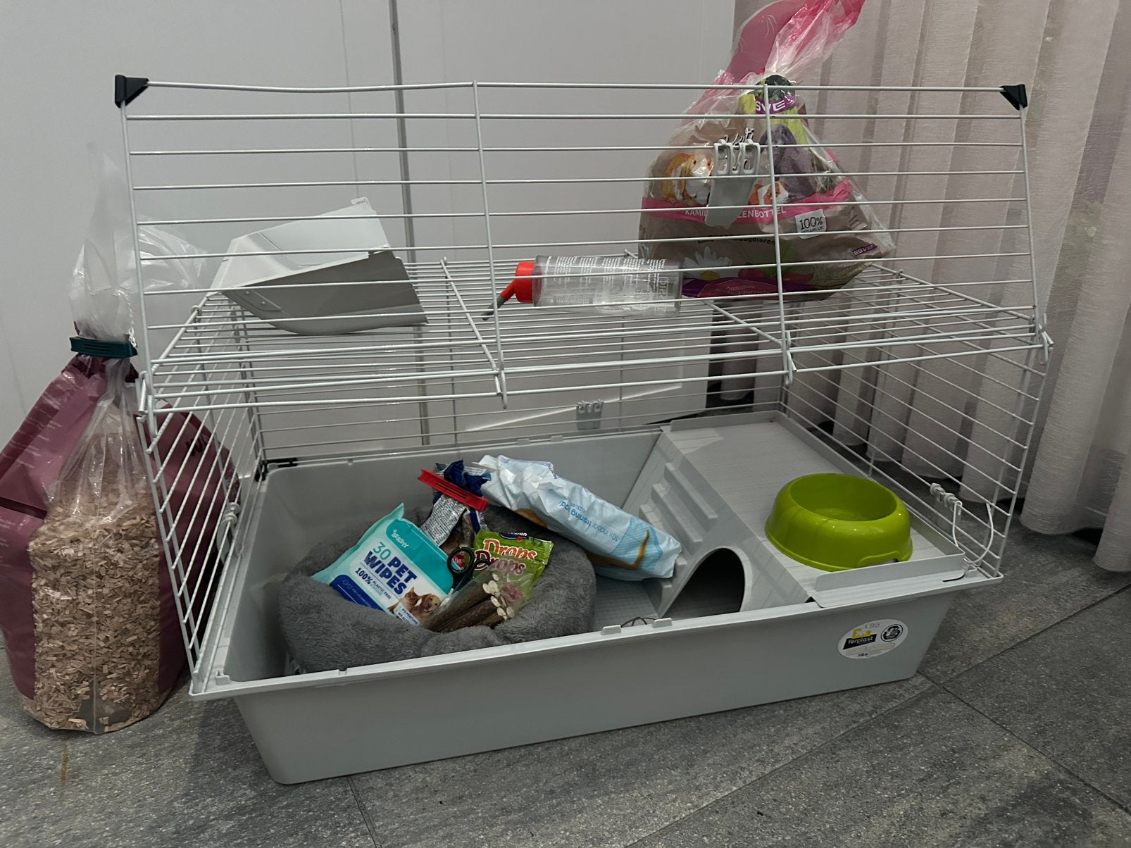 Cavia kooi met toebehoren, Ophalen