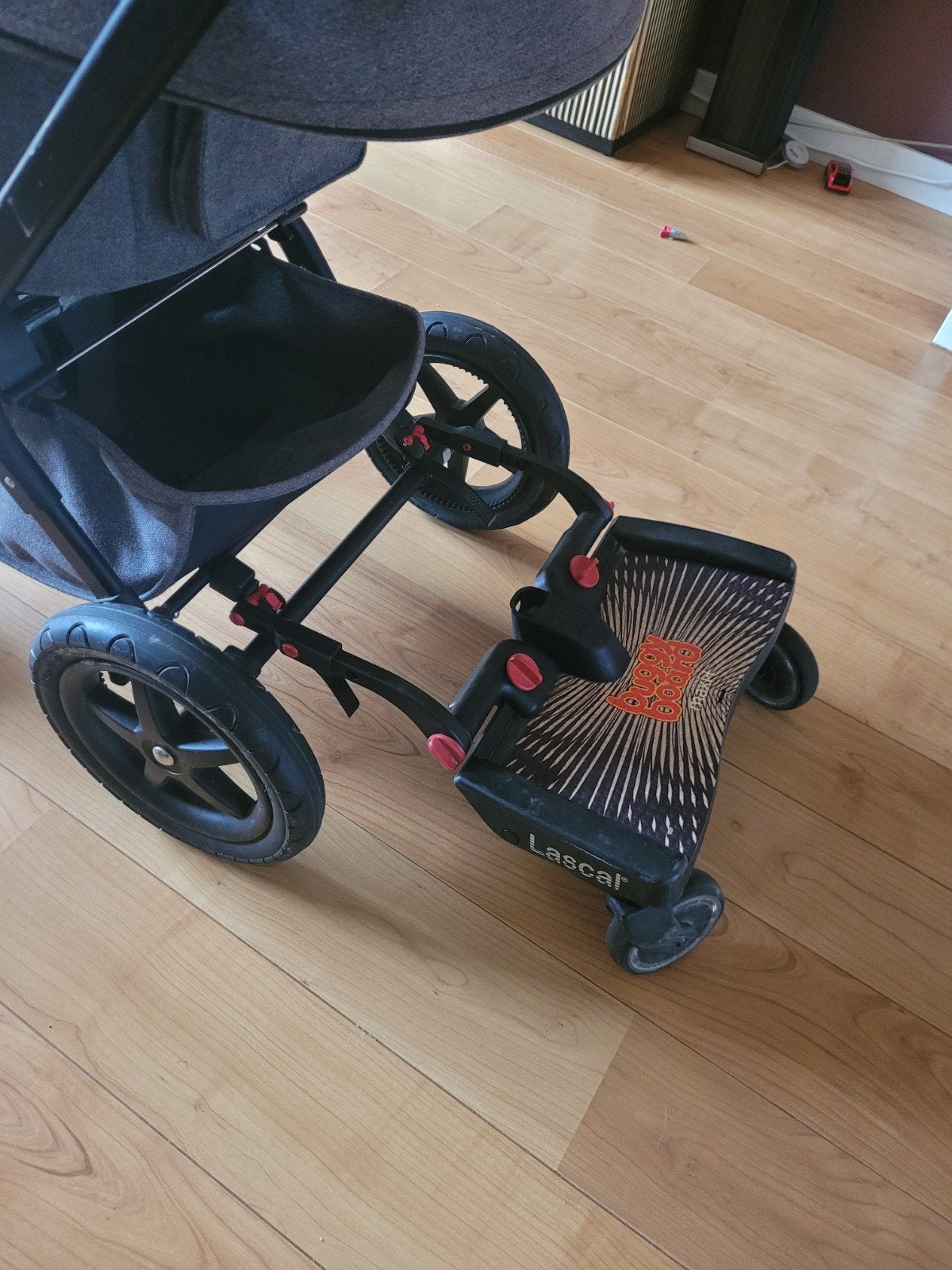 Mee rijd karretje voor achter de kinderwagen, Ophalen