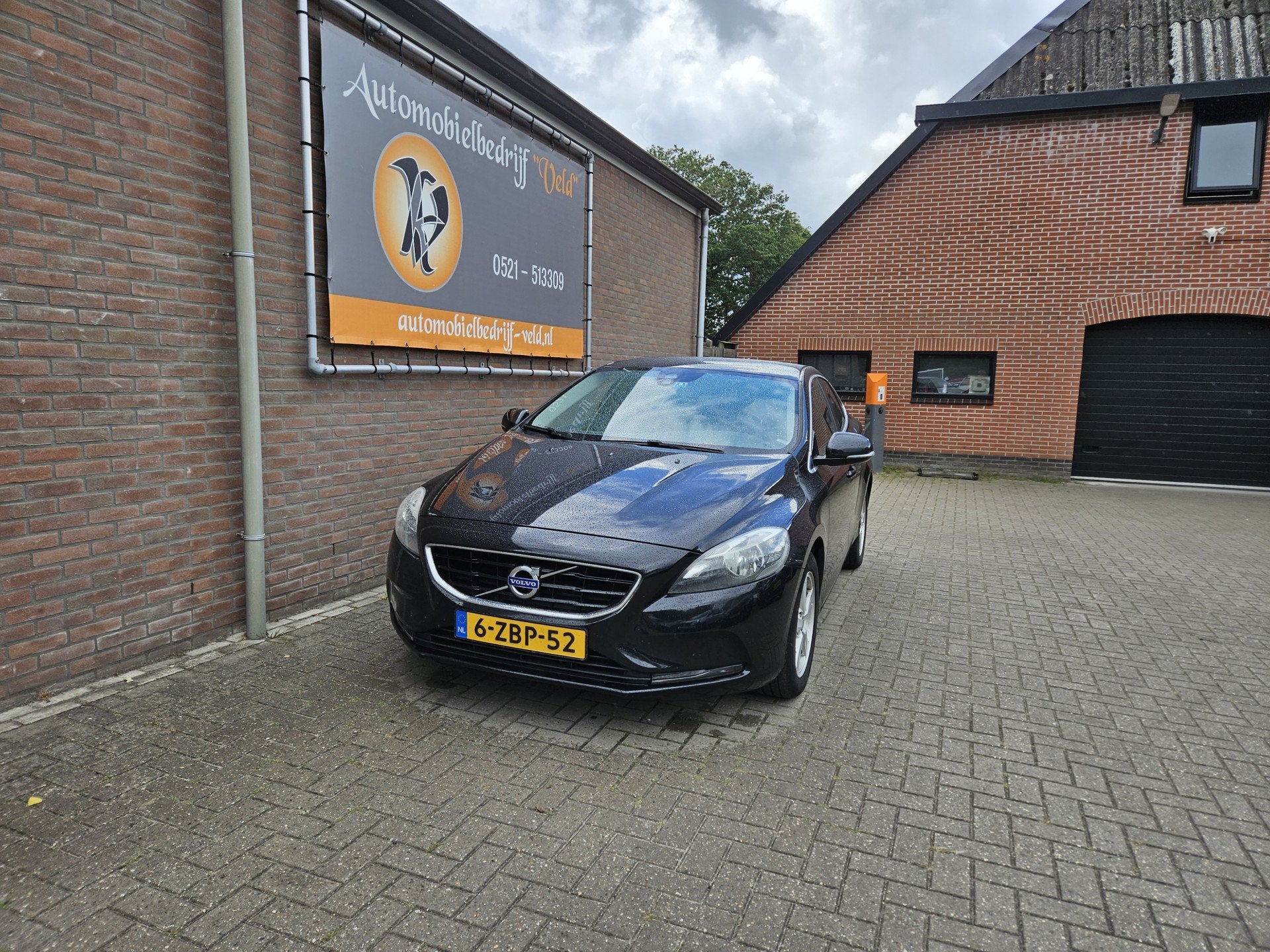 Volvo V40 2.0 D4 Momentum Business (bj 2014), Auto's, Voorwielaandrijving, Euro 5, Stof, Gebruikt