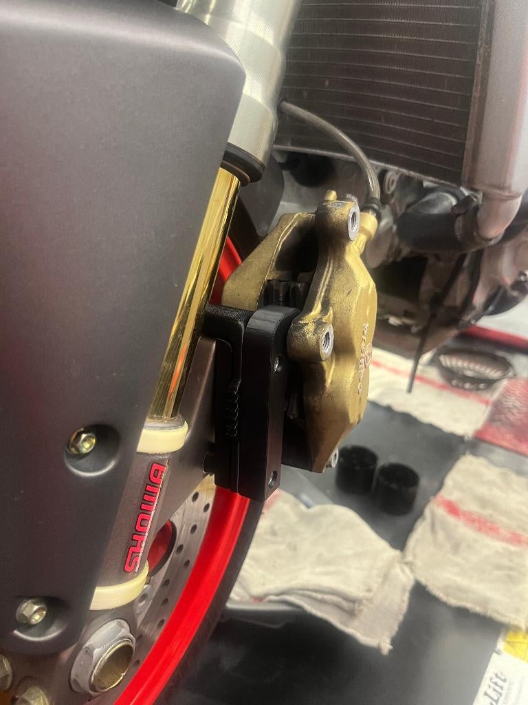Ducati remklauw ophangadapter – 65 mm (axiaal)(bandenwissel), Motoren, Ophalen of Verzenden, Nieuw