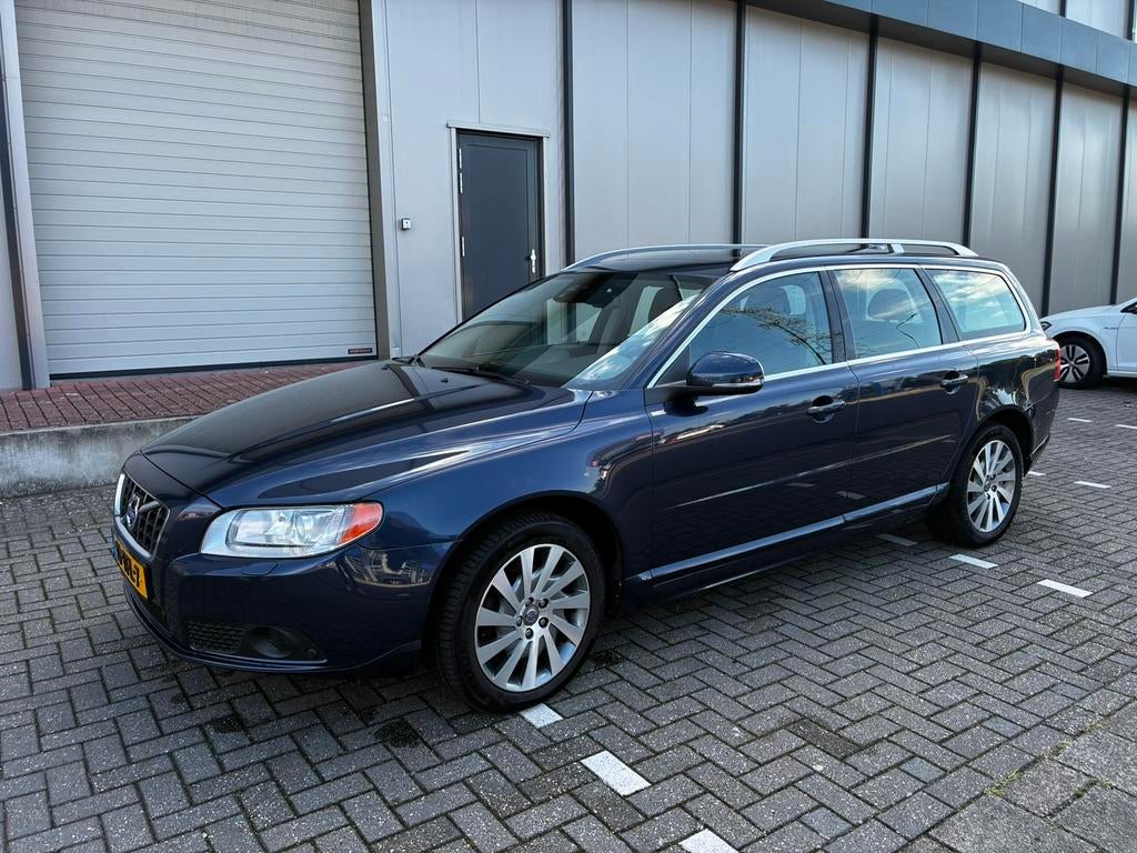 Volvo V70 T4 132KW 2012 Blauw, Auto's, Voorwielaandrijving, 1596 cc, 15 km/l, 4 cilinders