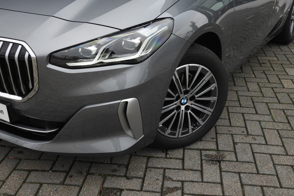 BMW 2 Serie Active Tourer 218i Luxury Line Automaat / Comfor, Auto's, BMW, 136 pk, Gebruikt, Met garantie (alle), 1445 kg