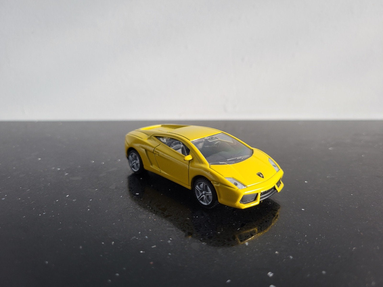 Lamborghini Gallardo LP560-4 geel 1/55 Siku, Ophalen of Verzenden, Zo goed als nieuw, Auto
