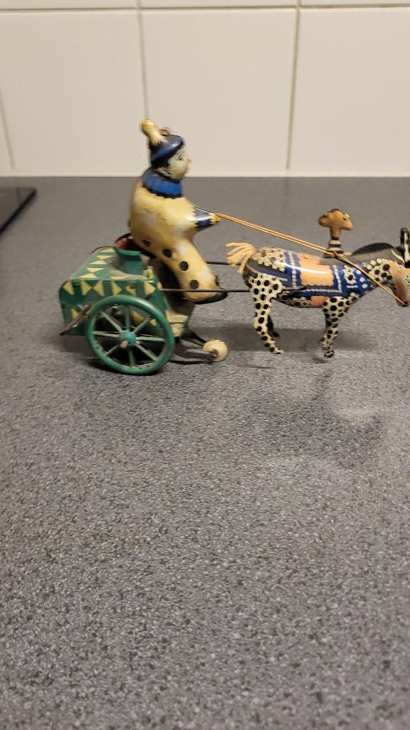 Blikken clown met paard, Antiek en Kunst, Antiek | Speelgoed, Ophalen of Verzenden