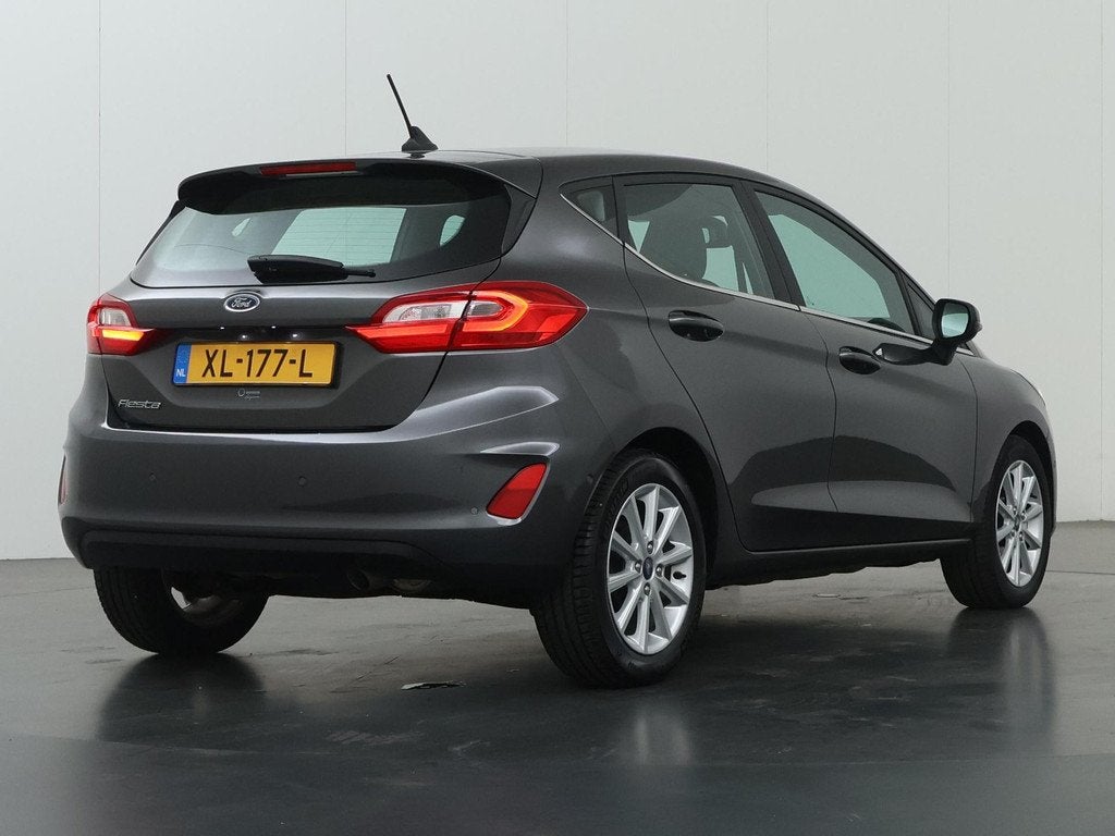 Ford Fiesta 1.0 EcoBoost Titanium | Winterpakket | Navigatie, Auto's, Ford, Gebruikt, Euro 6, 49 €/maand, Origineel Nederlands