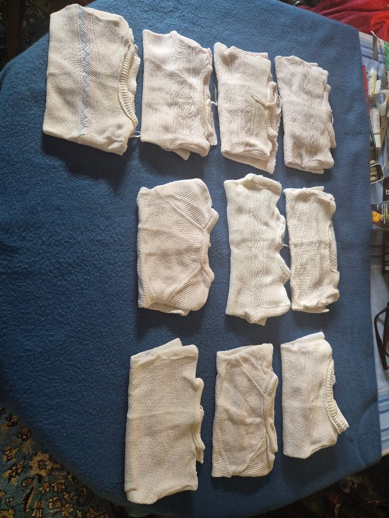 Set van 10 nostalgische antieke gebreide luiertruitjes, Ophalen of Verzenden, Zo goed als nieuw