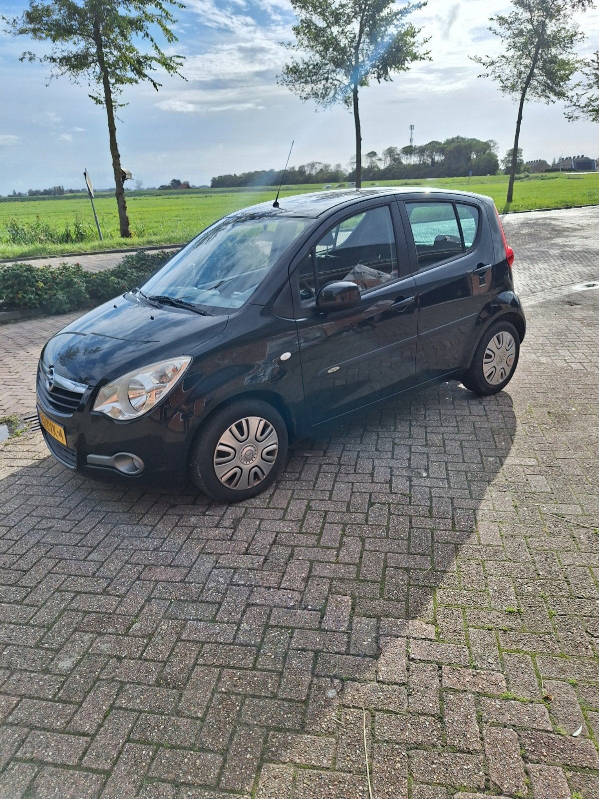 Opel Agila 1.2 16V 69KW 2013 Zwart, Auto's, Opel, Voorwielaandrijving, 4 cilinders, 965 kg, Zwart